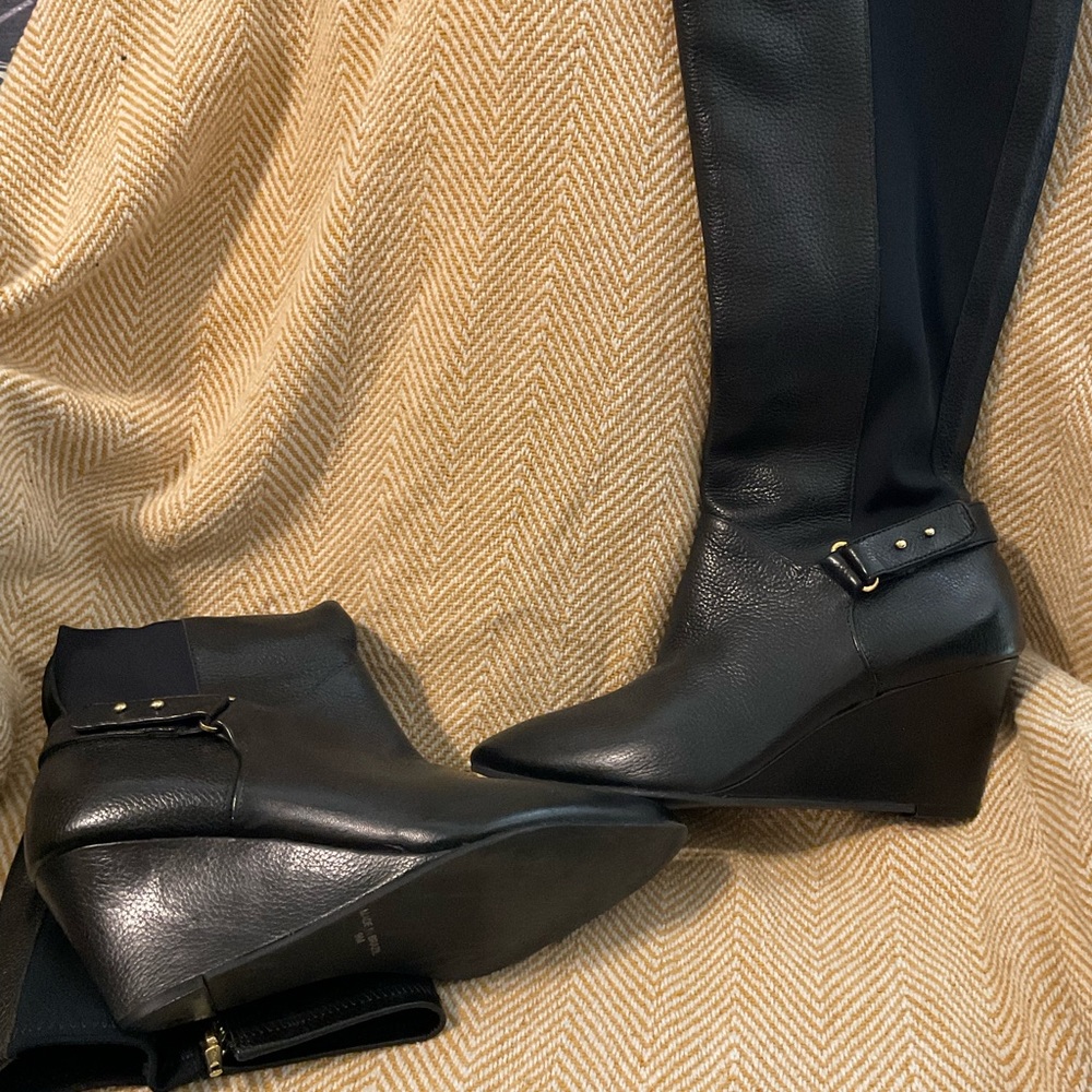 Black wedge boots. Made by Steve Madden:Steven